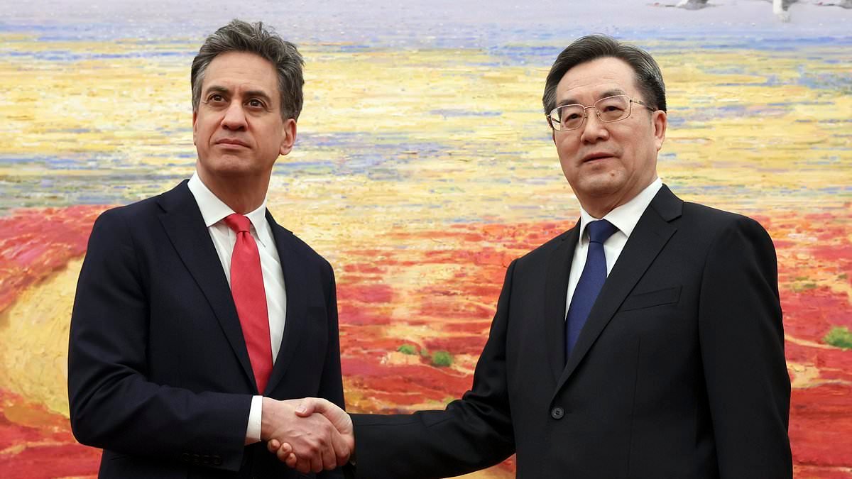 Squirming Ed Miliband refuses to explain why Labour is keeping secret details of green energy agreement with China amid spying fears