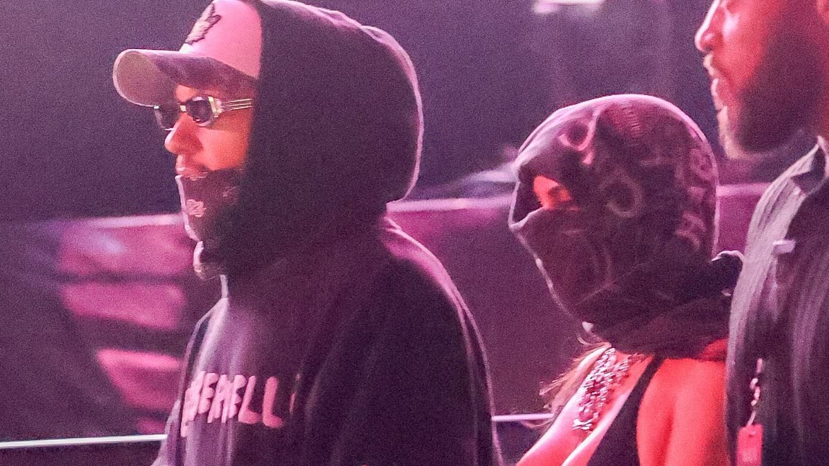 Kim Kardashian sweetly links arms with boyfriend Lewis Hamilton as romance heats up at Justin Bieber's Coachella set