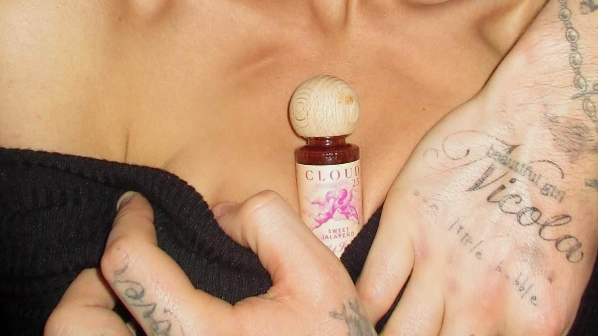 Brooklyn Beckham enlists wife Nicola Peltz for racy Instagram snap to promote 'the cutest and tiniest baby bottles' of his hot sauce