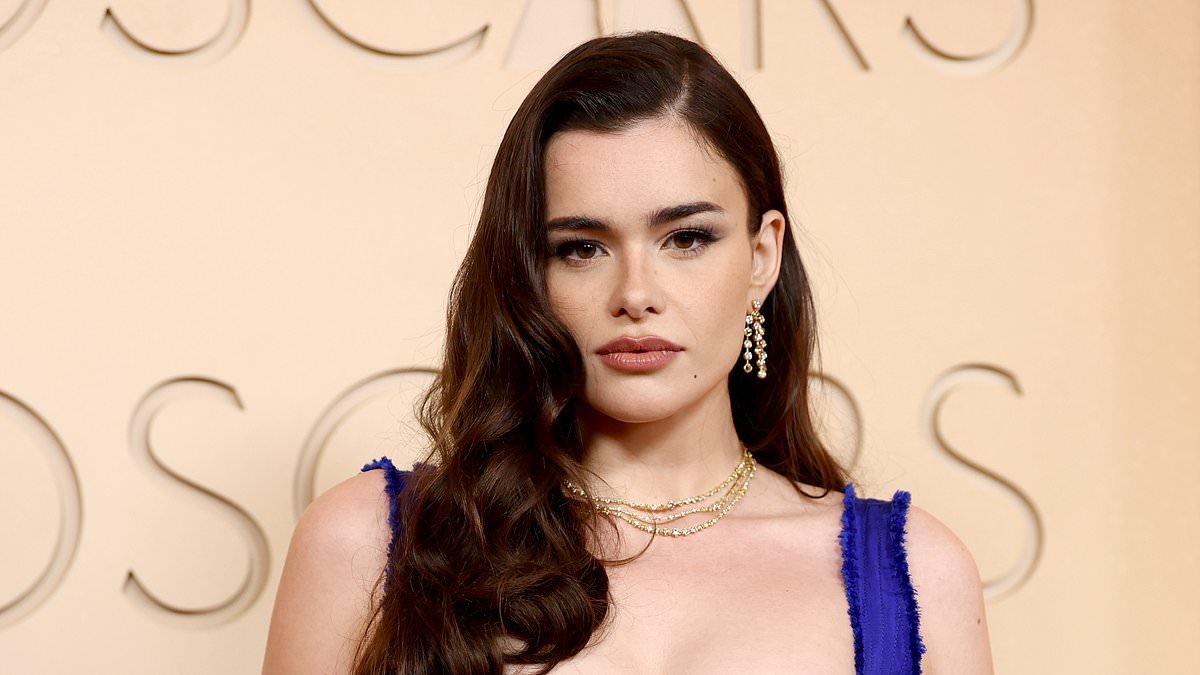 Euphoria star Barbie Ferreira is almost unrecognisable as she displays her drastic weight loss in a blue corseted gown at the Oscars after 'turning to Ozempic to revitalise her Hollywood career'