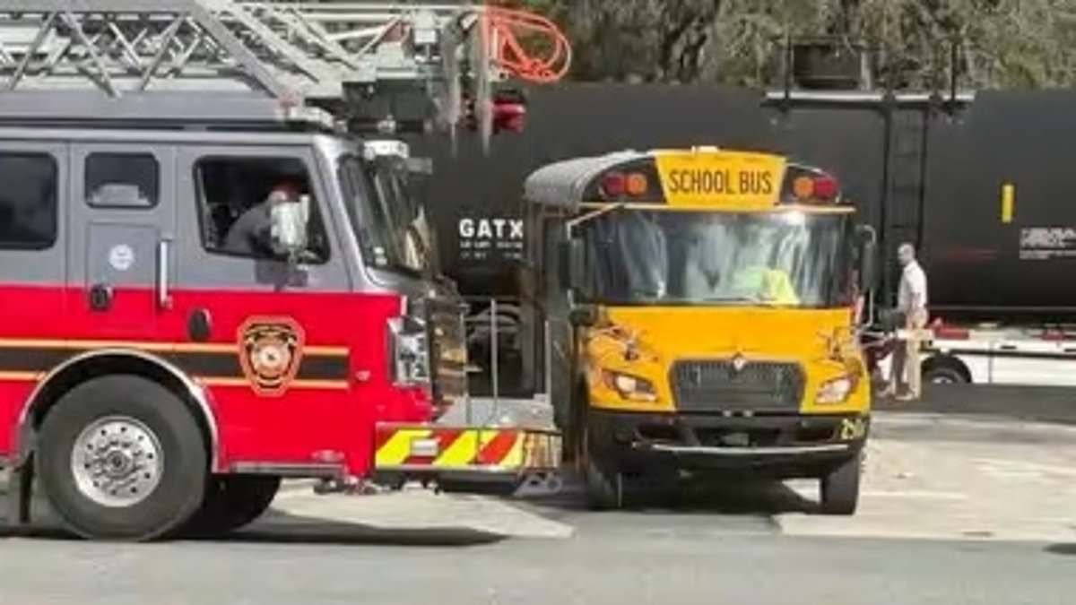 Terrified screams ring out after school bus driver IGNORED warning lights to drive vehicle packed with children into path of oncoming train