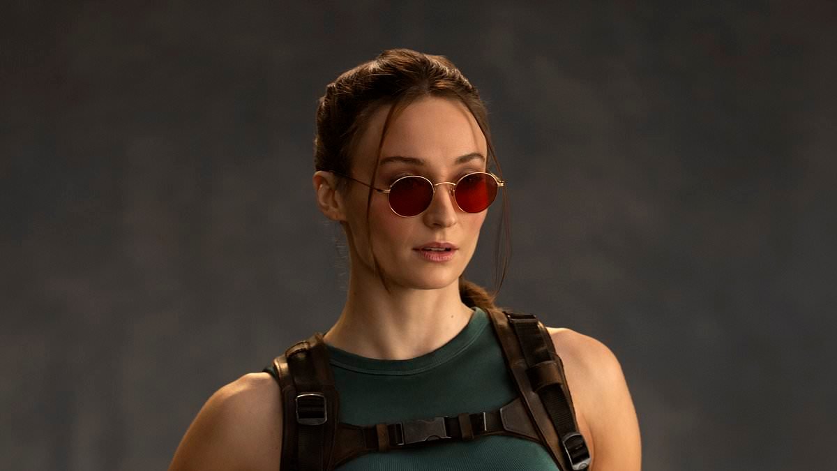 Sophie Turner seen 'dancing' with friends during night out in London four days after Lara Croft filming was postponed due to her back injury