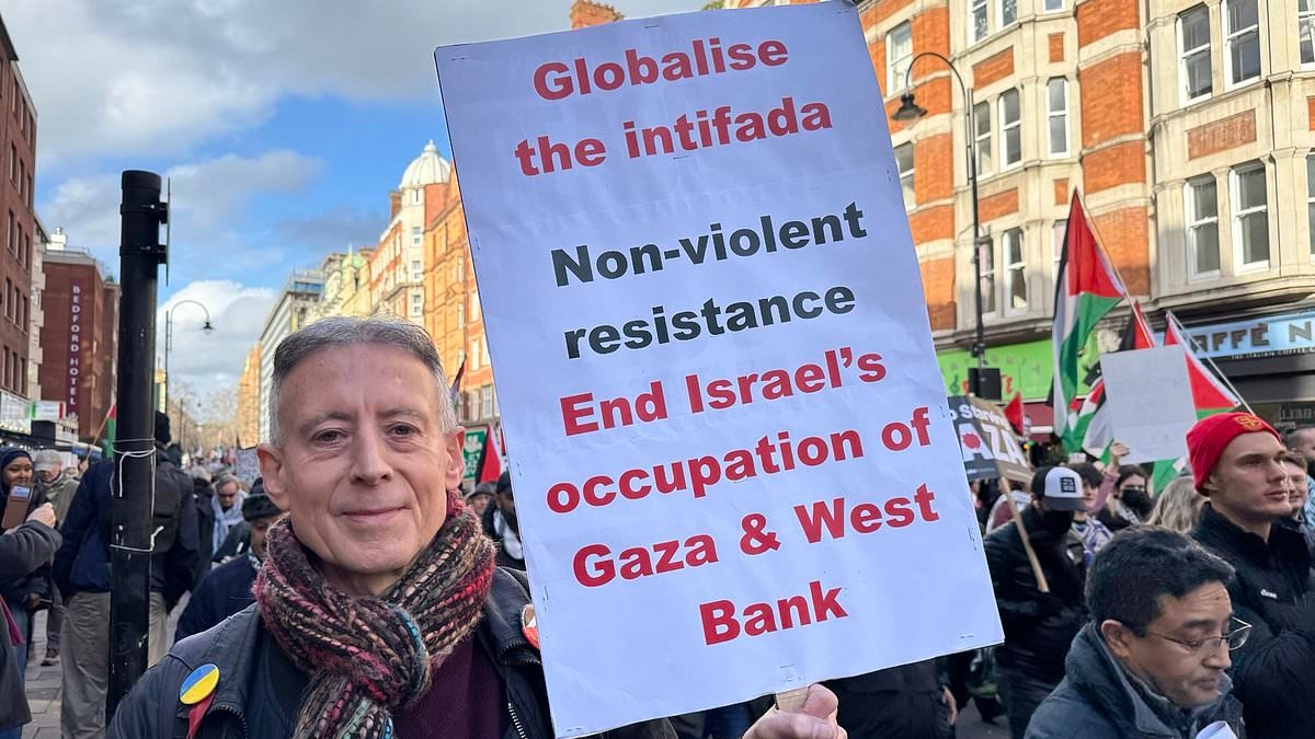 Peter Tatchell is arrested for 'globalise the intifada' banner at pro-Palestine demo where police battle to keep rival protesters apart