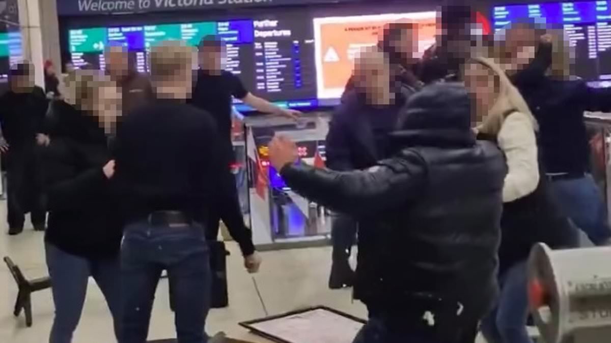 Moment mass brawl erupts outside JD Wetherspoons at busy London train station - with nine people arrested