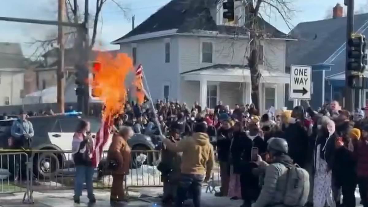 Furious protesters burn Stars and Stripes on streets of Minneapolis after woman was shot dead in her car by ICE agent