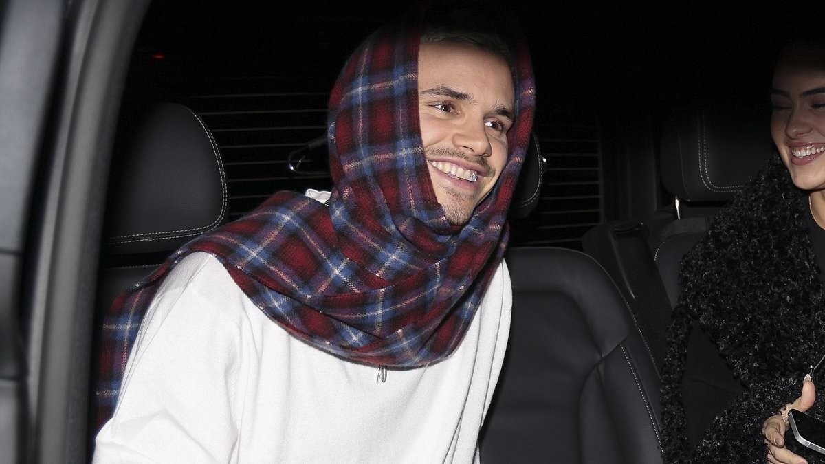 Romeo Beckham puts family feud aside as he heads to a party in Paris with girlfriend Kim Turnbull