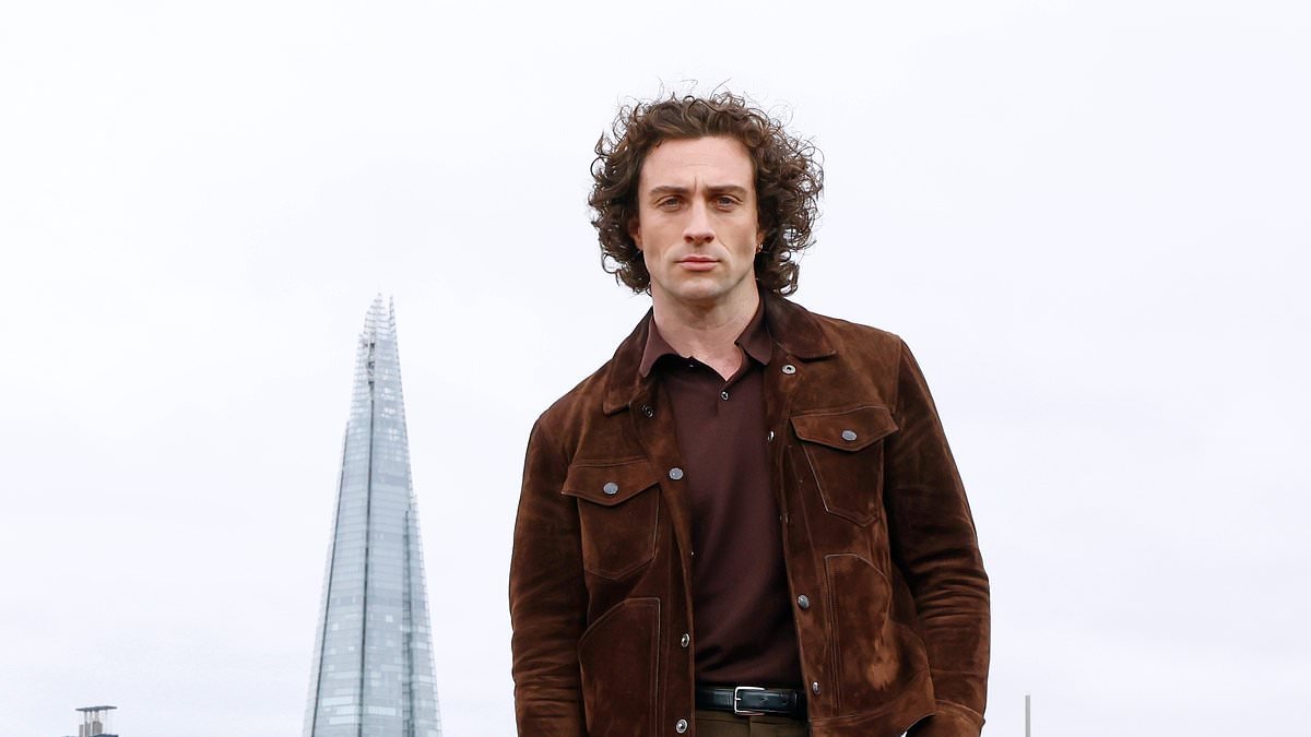 James Bond contenders Aaron Taylor-Johnson and Theo James recreate Daniel Craig's 007 overlooking the London skyline at Fuze photocall