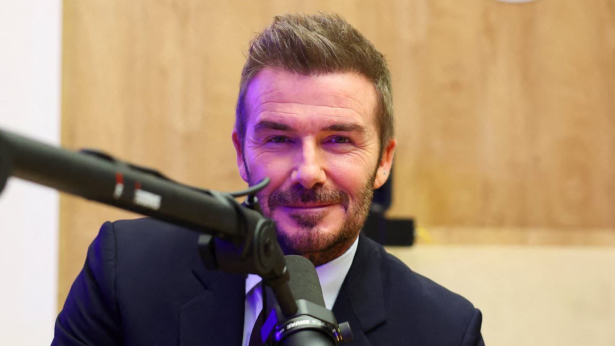 David Beckham struggles to smile as he is pictured for the first time since son Brooklyn's explosive statement about family feud as he appears at World Economic Forum in Davos