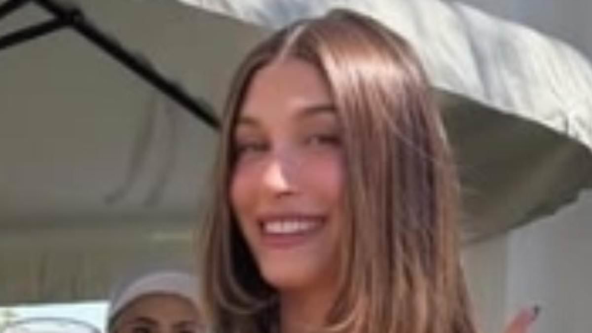 Hailey Bieber sizzles in a skimpy thong and 'Future Mrs. Bieber' shirt ahead of Justin's show as celebs frolic around Coachella Day 2