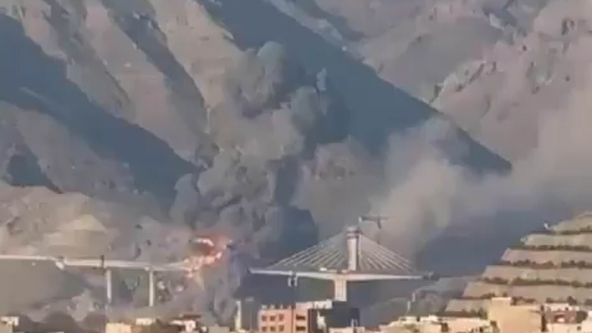 Moment Iran's tallest bridge - and highest in Middle East - is blown to pieces in US-Israeli airstrikes 'killing eight and injuring at least 95'