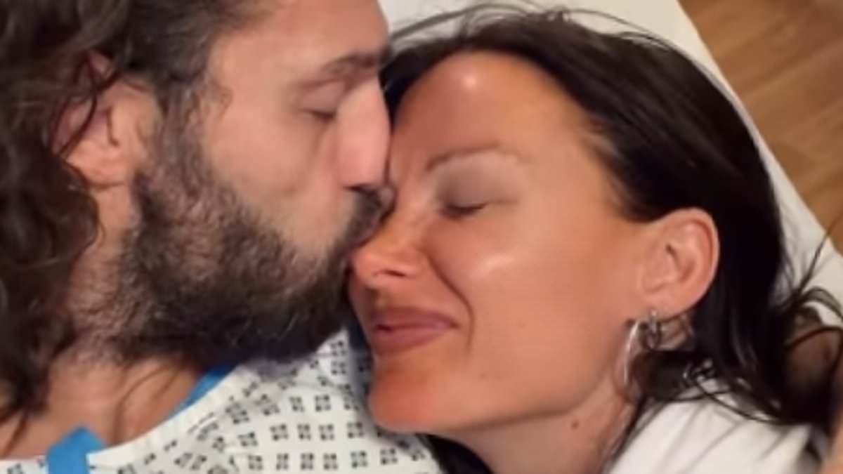 Andy Carroll reveals he has undergone hamstring surgery as he cosies up to girlfriend Lou Teasdale in loved-up clip from his hospital bed