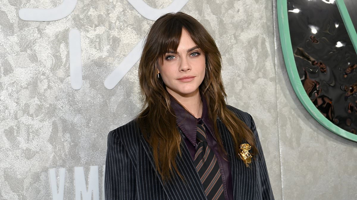 Cara Delevingne shows off her new brunette locks in an androgynous trouser suit while braless Scout Willis dares to bare in a sheer dress as they party at star-studded Warner bash