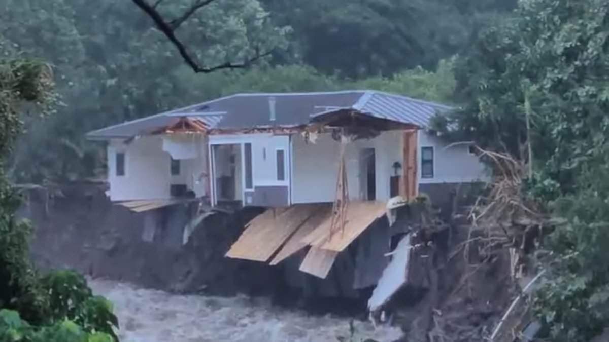 Elderly couple's dream Hawaii forever home is sucked into river by raging floods less than six years after they built it