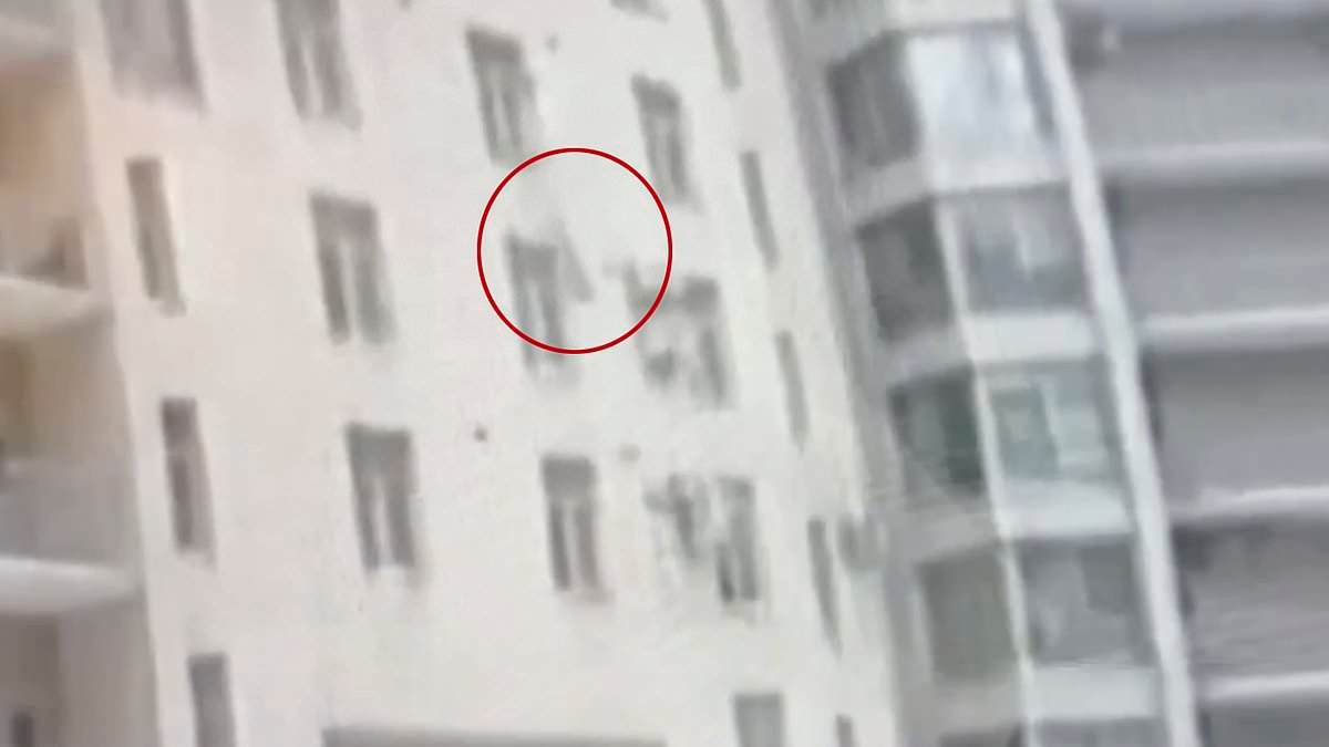 Hero CATCHES seven-year-old boy who plunged 80ft from apartment window