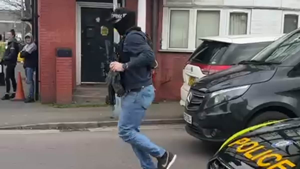 Armed police arrest man, 32, after another man was stabbed and woman was injured outside primary school in Birmingham