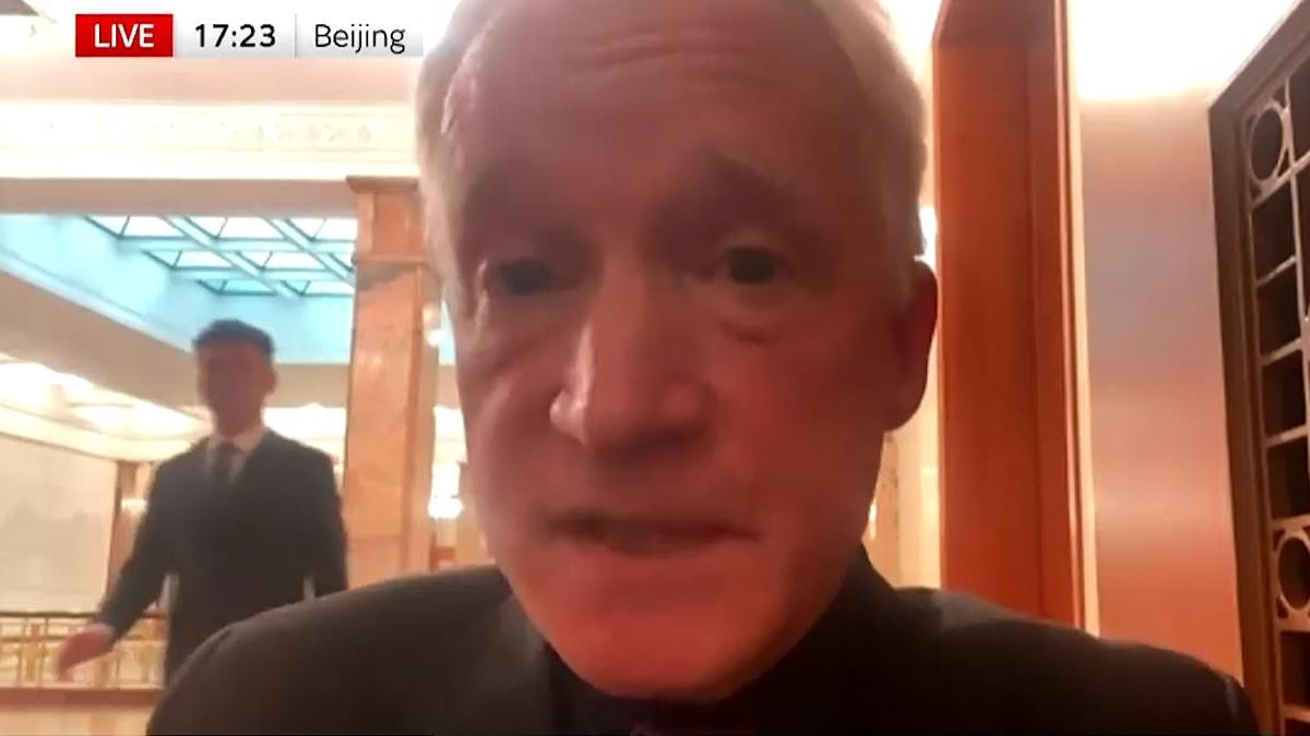 Moment Natural History Museum boss is moved on by Chinese security during Sky News interview