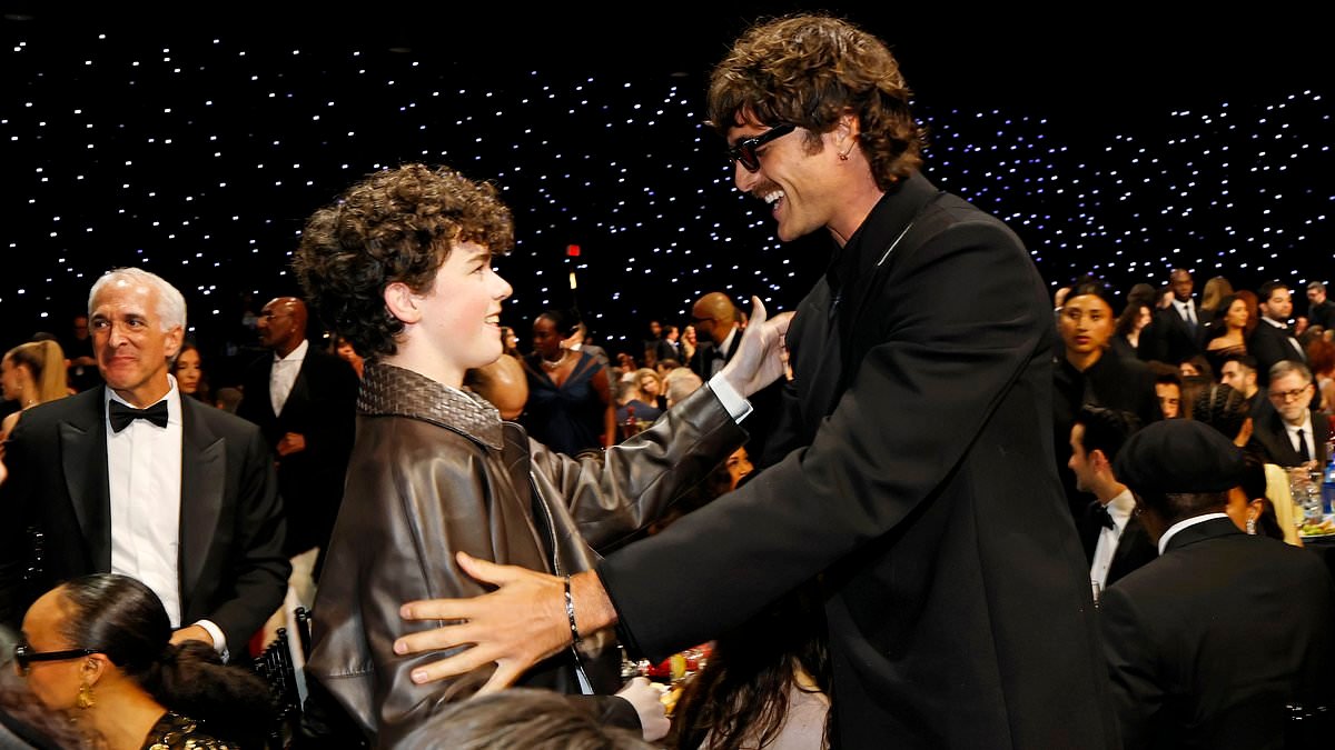 Owen Cooper is the toast of Hollywood as the youngest ever winner at the Critics Choice Awards: Actor, 16, chats to fellow winners  Timothée Chalamet and Jacob Elordi (and gets a triumphant hug from co-star Stephen Graham)