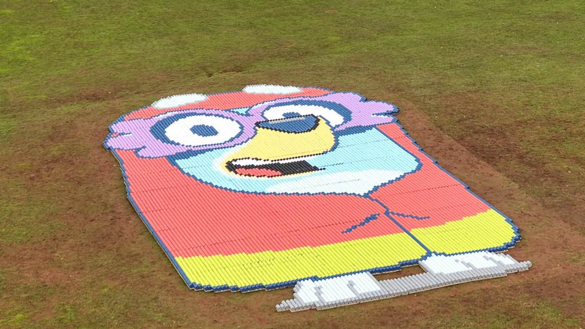 Alton Towers reveals opening date for world's first Bluey rollercoaster - via a giant portrait made with 11,000 cans of BEANS