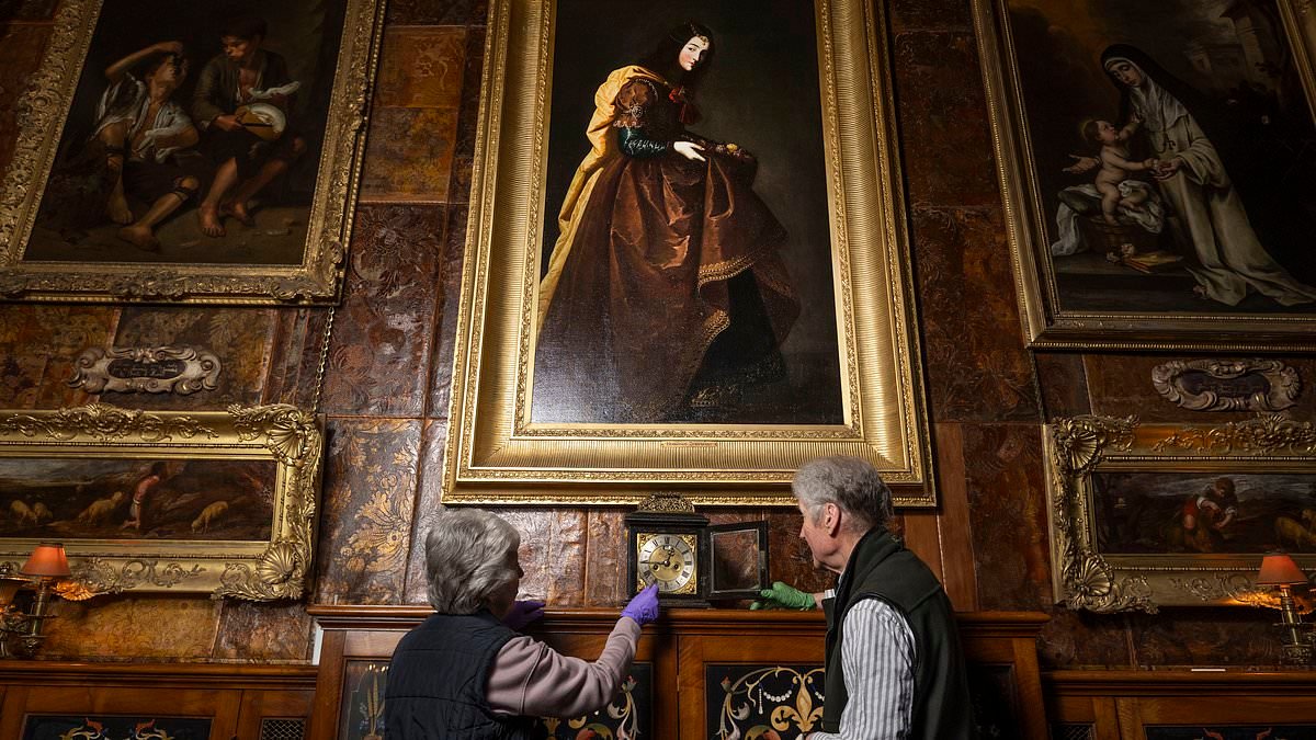 Don't forget! Volunteers adjust historic timepieces at country houses as clocks go forward tonight