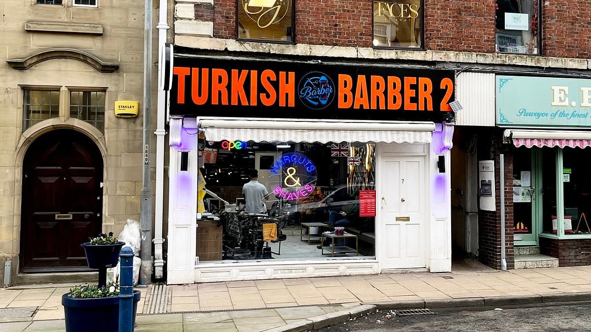 Turkish barber is ordered to tear down 'garish' sign which is 'harming' character of medieval market town