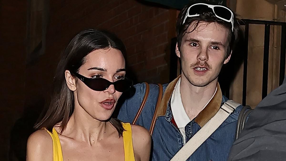 Cruz Beckham is supported by girlfriend Jackie Apostel and merch-wielding nan Sandra at his penultimate UK gig after breaking down over single 'inspired by Brooklyn's estrangement'