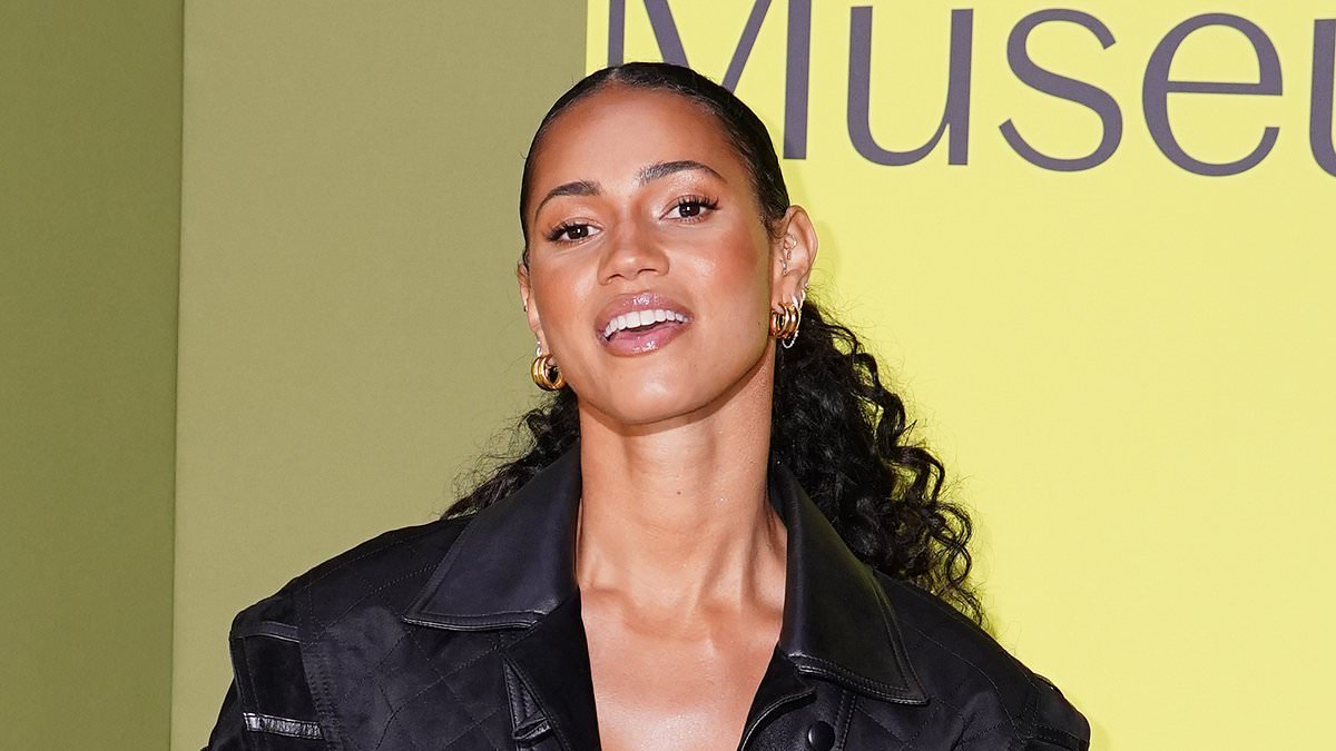 Vick Hope catches the eye in a leather minidress and statement jacket as she arrives for the V&A's East Storehouse Museum opening