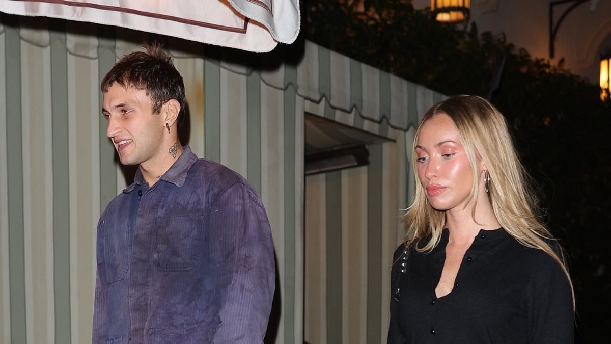 Anwar Hadid looks in high spirits as he leaves Chateau Marmont with a Nicola Peltz-lookalike after his sister Alana waded into Beckham feud to brand his ex-girlfriend fame-hungry