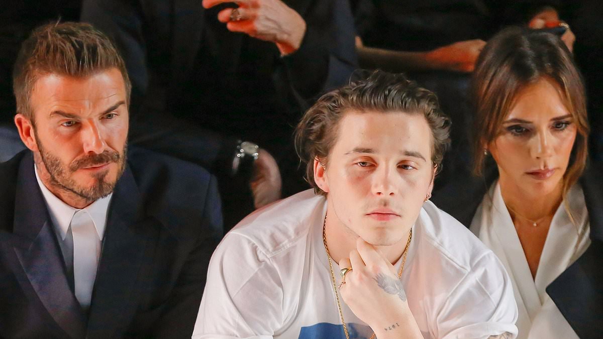 How Brooklyn Beckham dropped out of photography school in New York after just one year because he was 'homesick' and 'adored' his parents - amid explosive claims David and Victoria 'controlled' him his 'entire life'