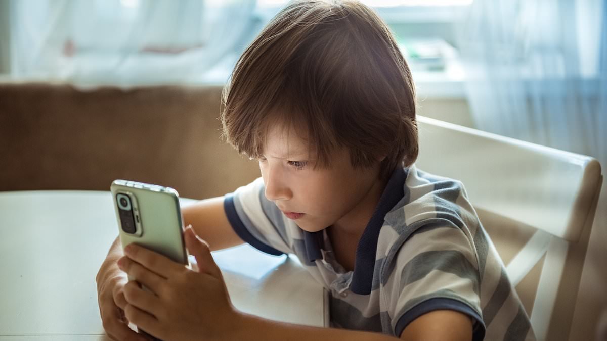 Child phone use is now a public health emergency, doctors say amid growing fears over damage to physical and mental health