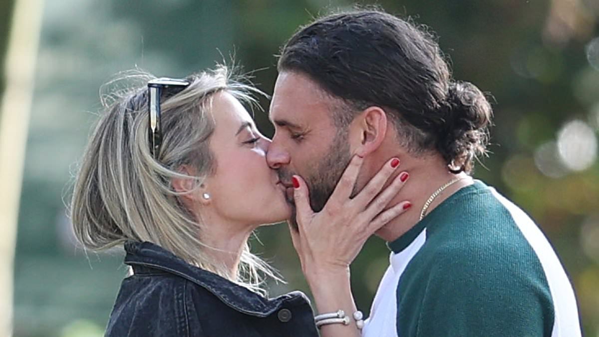 Holly Valance pictured kissing her new flame... who previously worked as a bodyguard at family home she shared with her ex