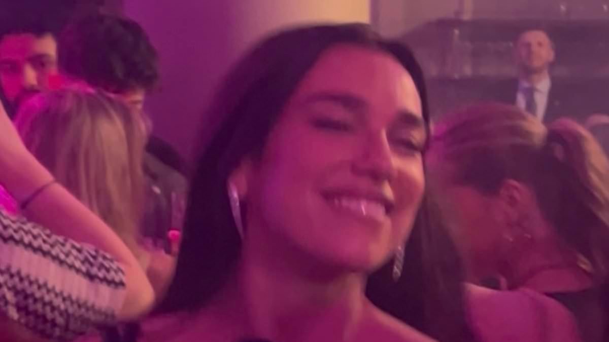 Dua Lipa lets her hair down until the early hours as she parties with childhood best friend at boozy Warner's BRITs afterparty