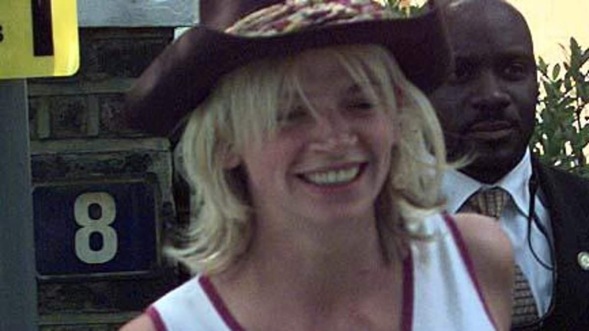 Zoe Ball reveals the story behind that infamous whiskey and cigarettes wedding day photo as her ex husband Fatboy Slim gushes 'and that's why I married you'
