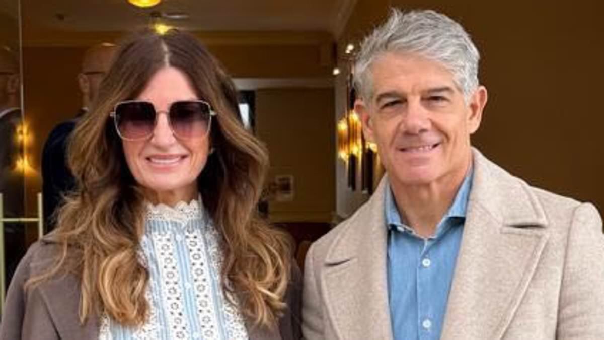 Karren Brady, 56, looks stylish as she  holds hands with husband Paul Peschisolido as she treats her parents to 60th wedding anniversary on the British Pullman