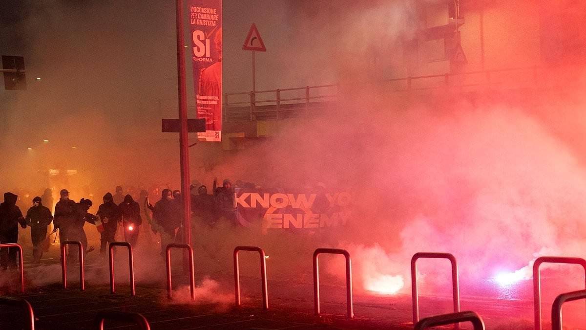 Riot police clash with protesters at Milan Winter Olympics among tear gas as six are arrested