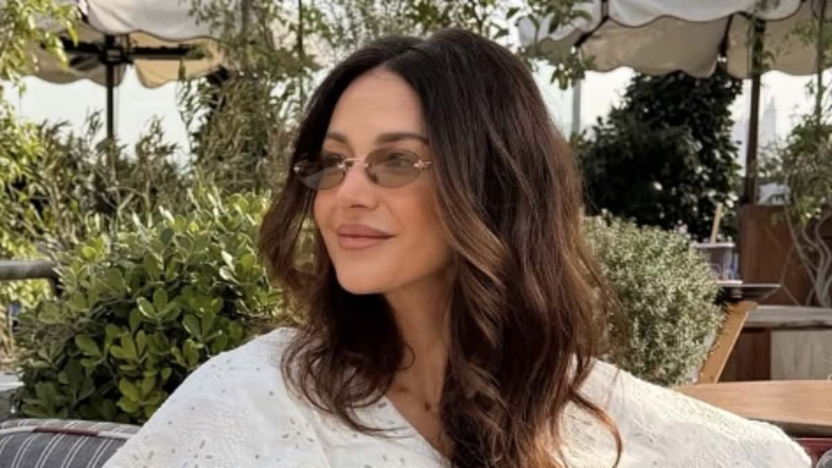 Michelle Keegan racks up the air miles as she jets to LA just days after flying home from Abu Dhabi - as she prepares to hit Hollywood as Reese Witherspoon eyes her up for a role