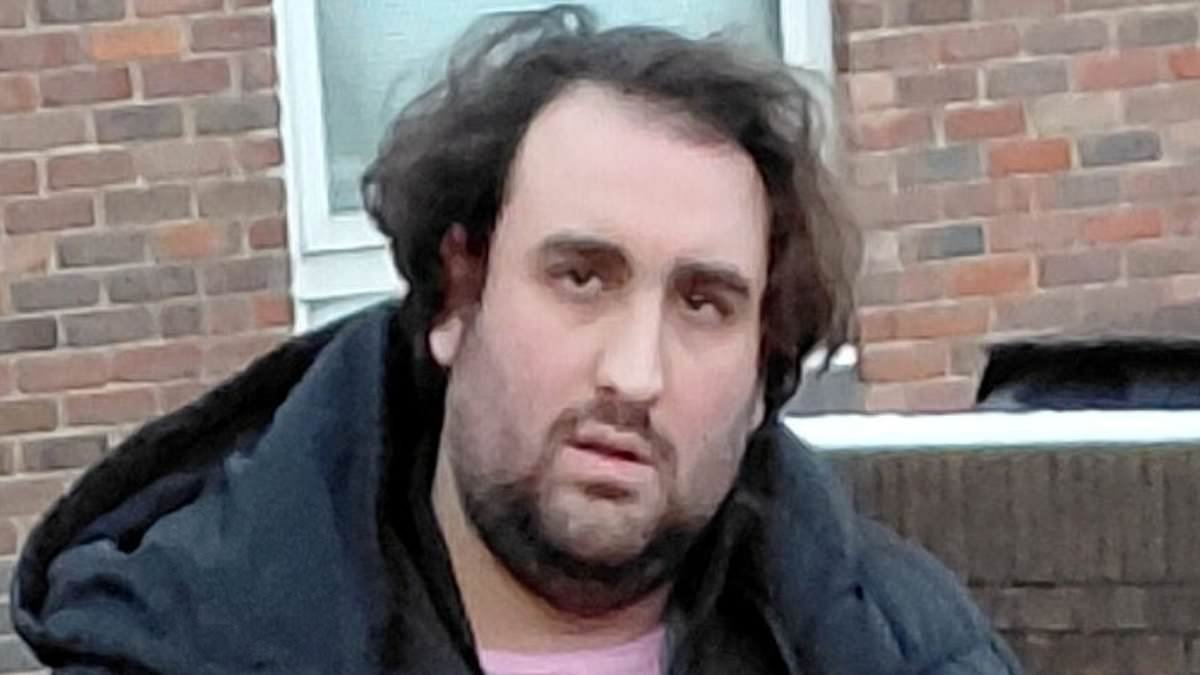 Bearded trans woman appears in court in skirt accused of £100,000 blackmail plot to firebomb legal firm