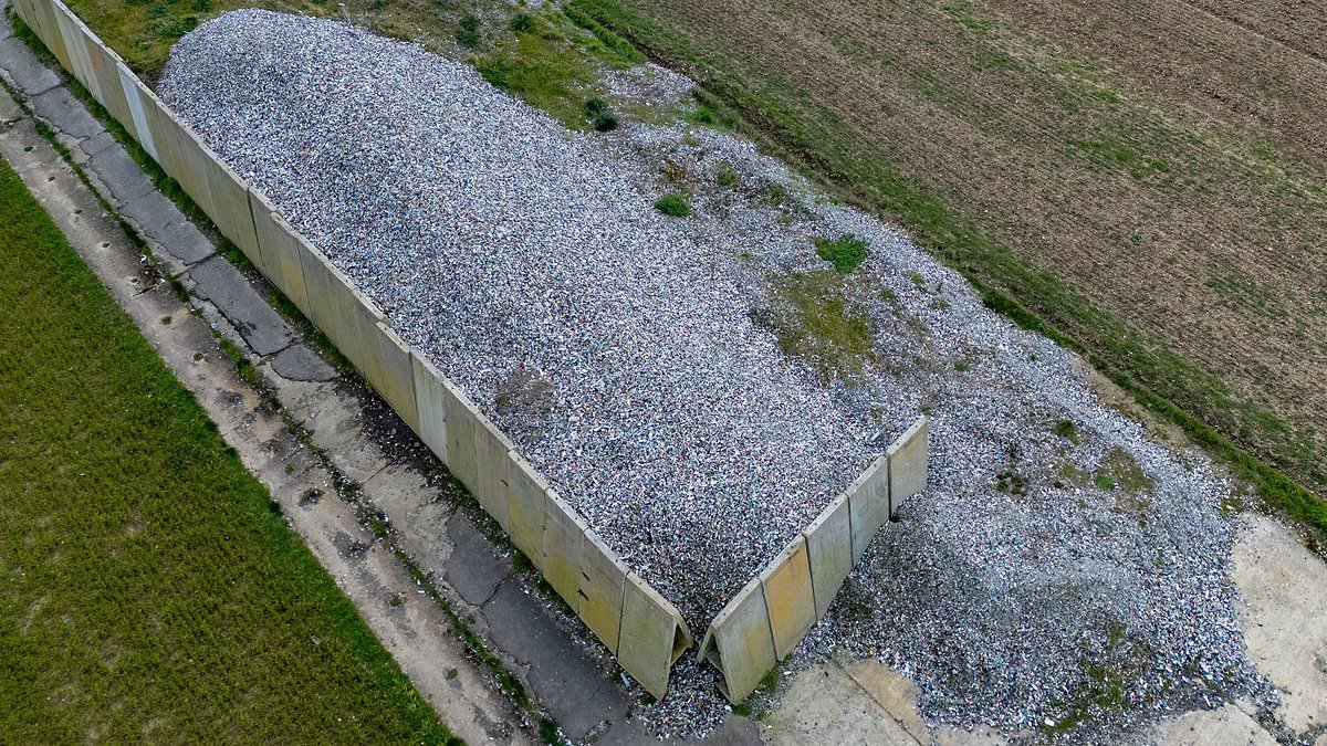 Fly-tippers dump huge mountain of illegal waste on disused WW2 airfield - as landowner is taken to court