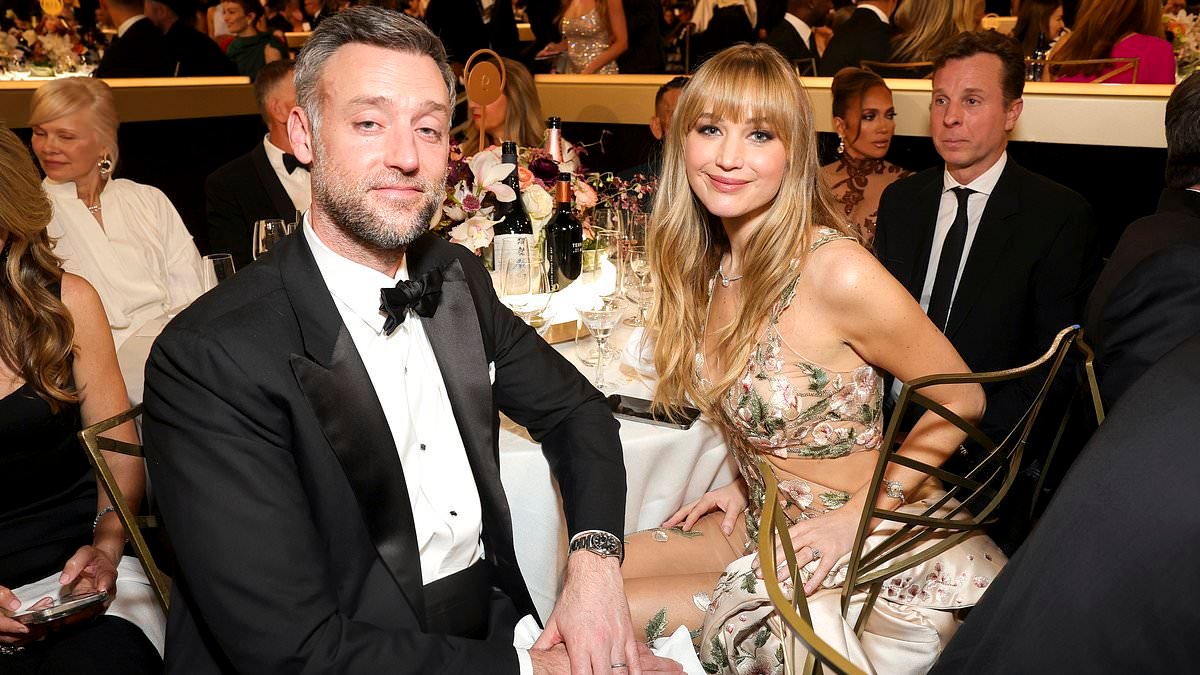 Jennifer Lawrence makes a rare award show appearance with husband Cooke Maroney at the Golden Globes as she turns heads in a daring 'naked dress'