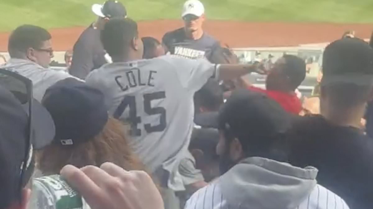 Vicious brawl breaks out among fans at Yankees game as New York star watches chaos unfold from the field