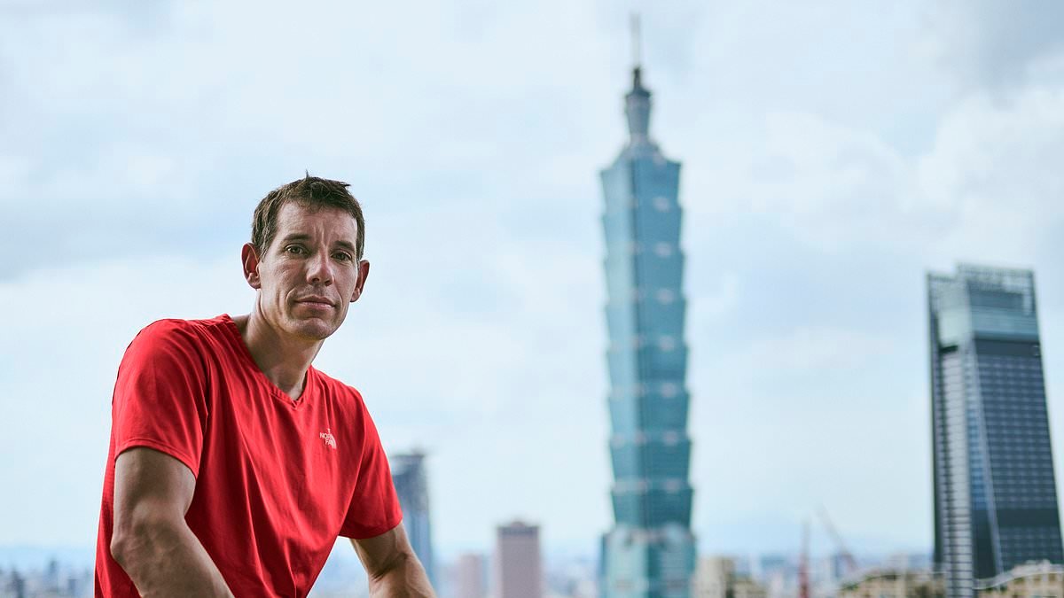 Daredevil aiming to climb 101-storey tower without ropes and live on Netflix puts attempt on hold for 24 hours after safety fears