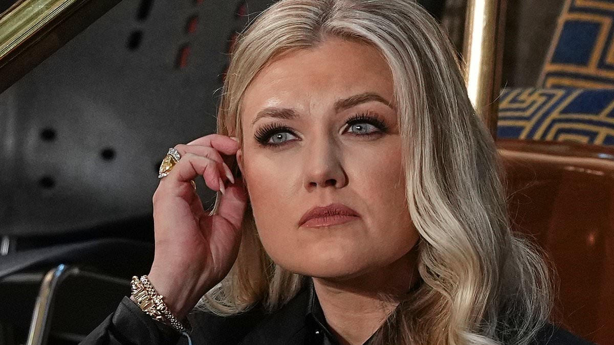 As Erika Kirk FINALLY comes out of hiding at State of the Union, shock new exposé plagues 'giggling' widow... who can't shake questions over her tears and THOSE leather pants