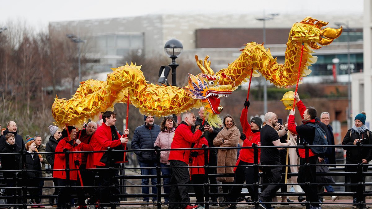 The Year of the Horse: Dragon dancers perform in Liverpool parade as Lunar New Year celebrations begin with colourful display