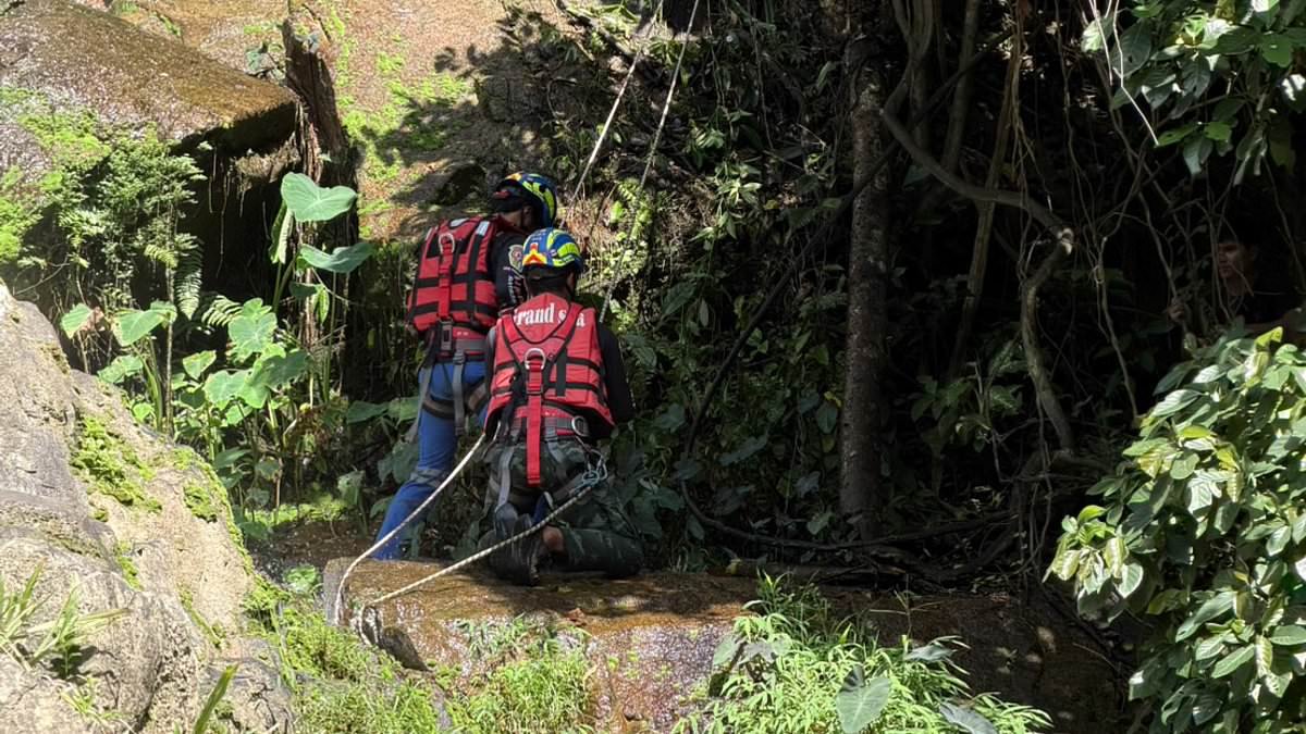 Tourist falls to death at notorious Thailand waterfall 'while taking photos with girlfriend'