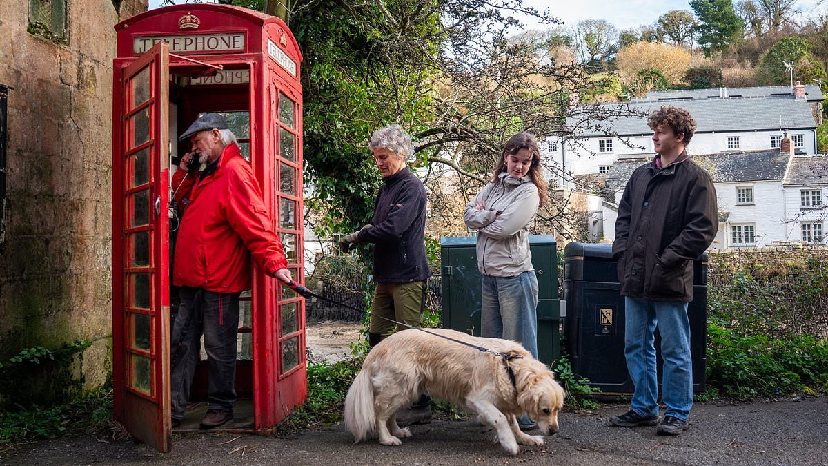 Villagers blacked out from broadband and telephone for weeks by Storm Goretti turn to traditional red phone box instead to stay in touch