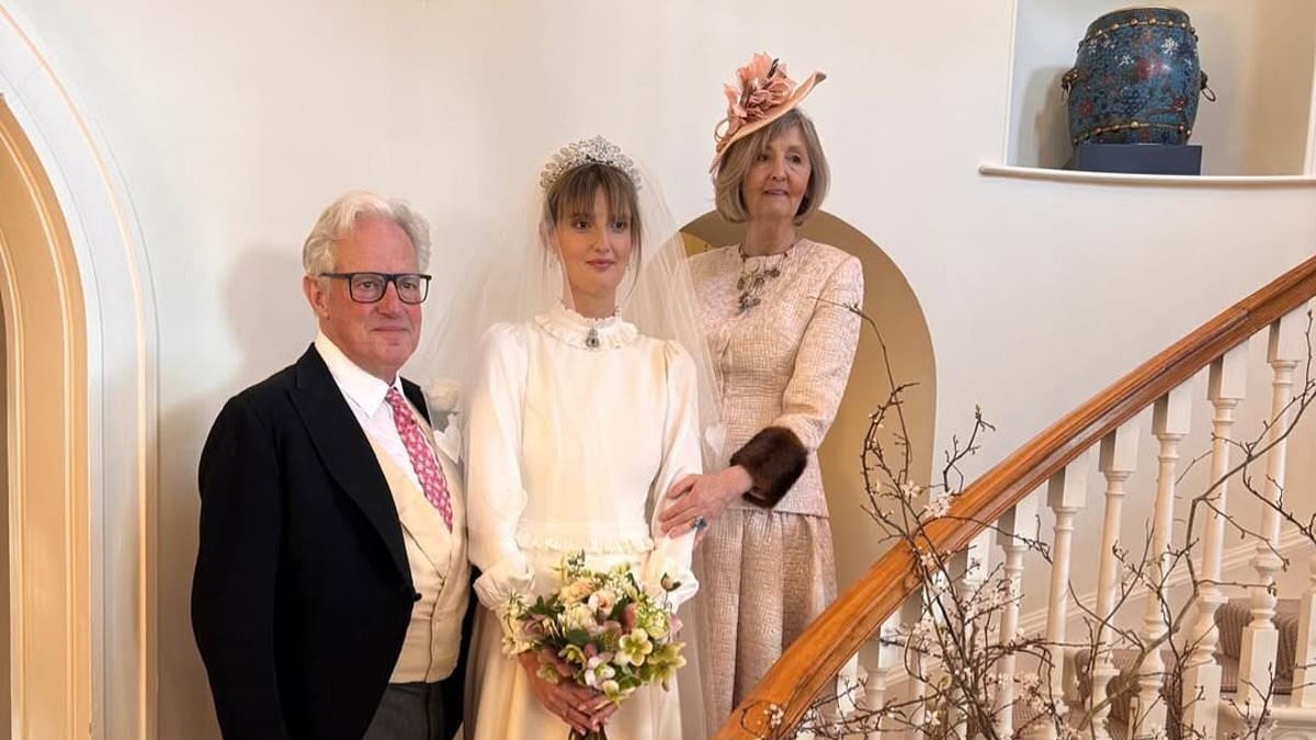 A merry Mitford wedding! High society scion Nancy Morrison weds in Valentine's Day ceremony complete with cupid Guinness, a red velvet evening dress and a VERY lively dance floor
