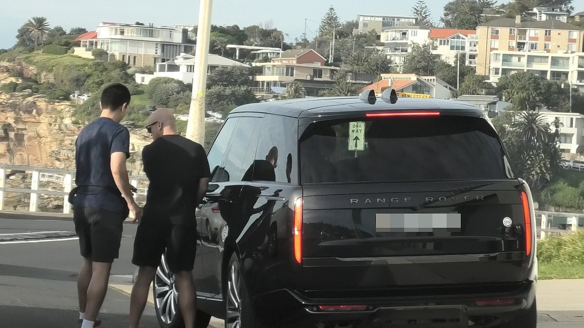 Meghan and Harry thrill Bondi crowds - as pics prove how YOU paid for HER to do iconic coastal walk