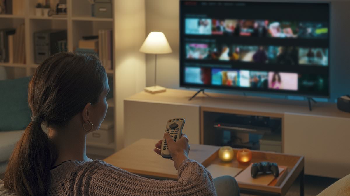 Revealed: The nation's biggest TV-watching sins from shoes on the sofa to phones on loud