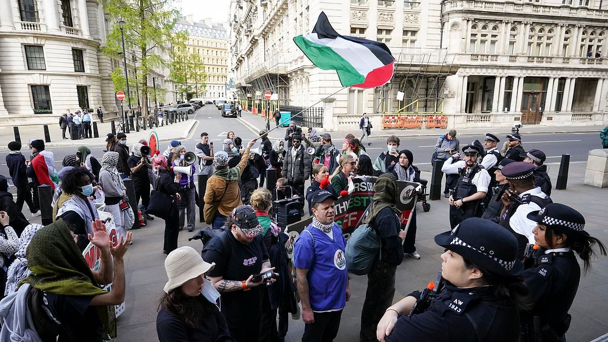 Pro-Palestinian protesters swarm Royal Navy officers calling them 'baby killers' as they storm Ministry of Defence HQ in 'disgraceful' protest