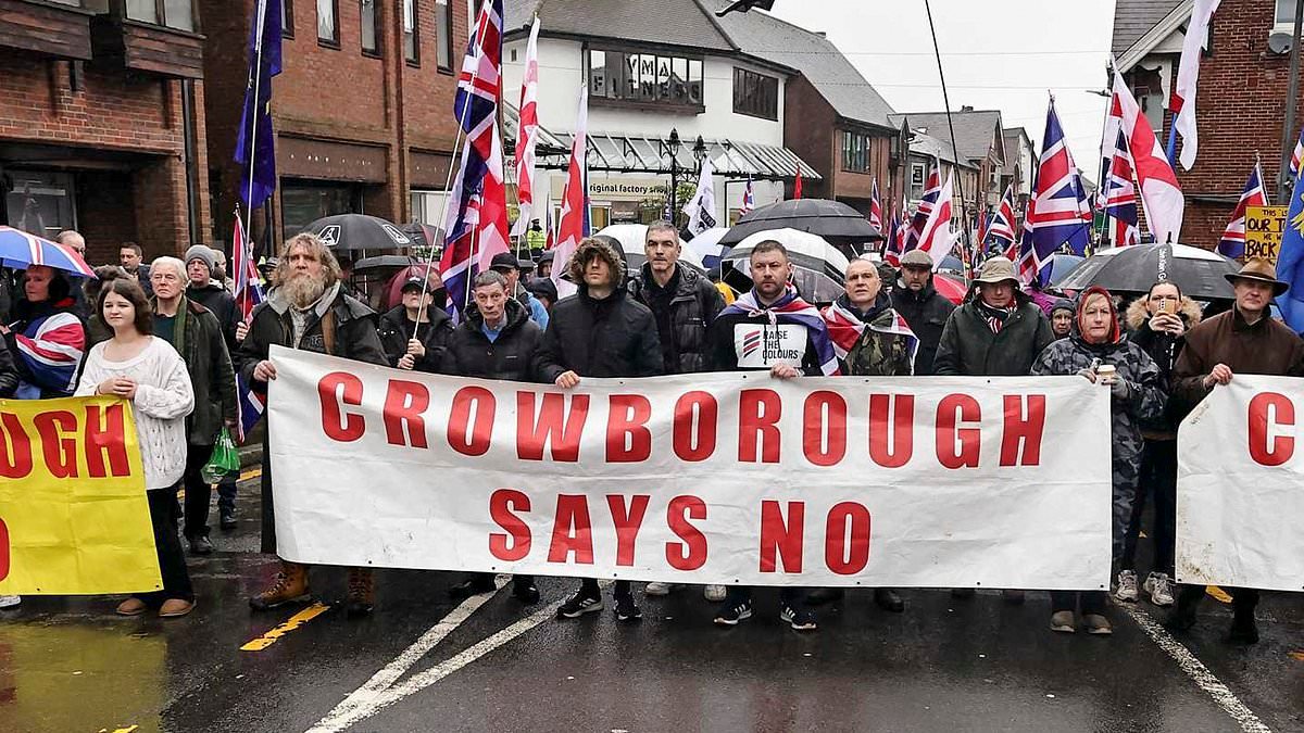 Crowds chant 'Keir Starmer is a traitor' as hundreds protest in Crowborough after male migrants moved into nearby ex-army barracks