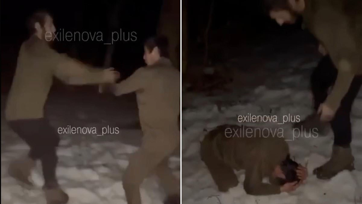 Putin's ruthless commanders force two terrified soldiers to fight each other with loser tied to a tree in sub-zero conditions as 'punishment'